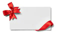 close up of a note card with ribbon bow on white background